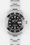 Front view of a stainless steel Rolex Sea-Dweller watch with black dial, luminous hour markers, date magnifier, and rotating bezel, displayed against a plain white background.