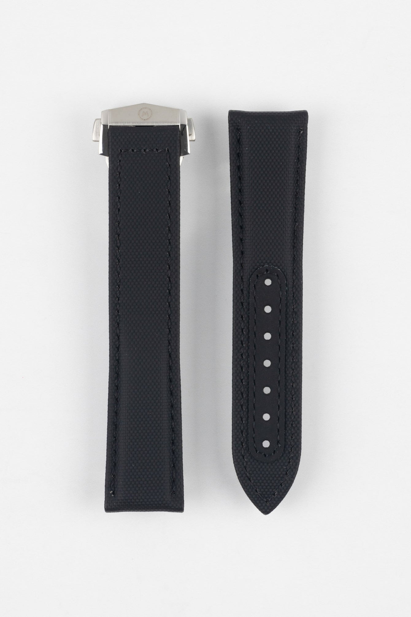 Two black textured watch strap pieces displayed side by side on a light grey background, one with a silver clasp attached and the other with adjustment holes along the length.