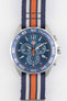 TAG Heuer Formula 1 Gulf Edition chronograph with a blue, white, and orange NATO strap displayed on a white background.