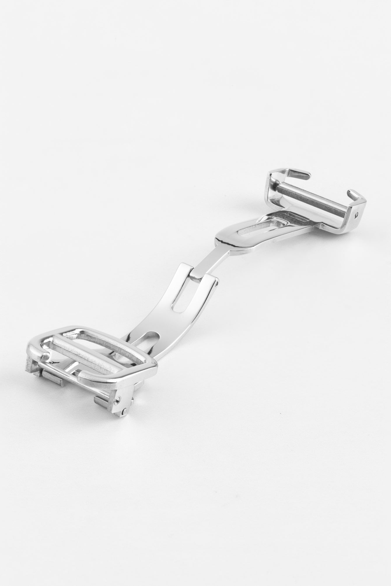 A polished silver-colored deployant clasp, fully extended and laid flat, on a white background. The intricate folding mechanism and spring bars are visible.