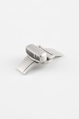 Brushed stainless steel butterfly deployment clasp displayed partially opened on a clean white background. The clasp features a dual-folding mechanism, integrated push-button release system, and curved folding blades designed to provide a secure, comfortable fit for leather watch straps while reducing strap wear during fastening and removal.
