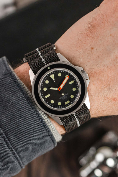 Unimatic Modello Uno U1-MLB Edition of 200 fitted with Erika's Originals Black Ops watch strap in full black with lumed centerline worn on wrist