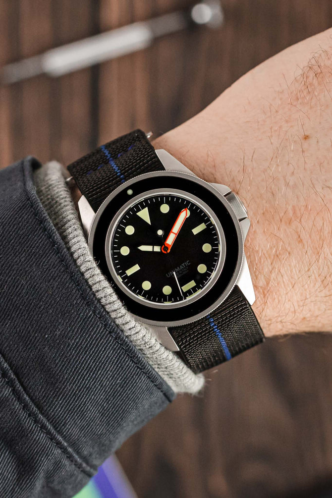 Unimatic Modello Uno U1-MLB Edition of 200 fitted with Erika's Originals Black Ops watch strap in full black with navy centerline worn on wrist