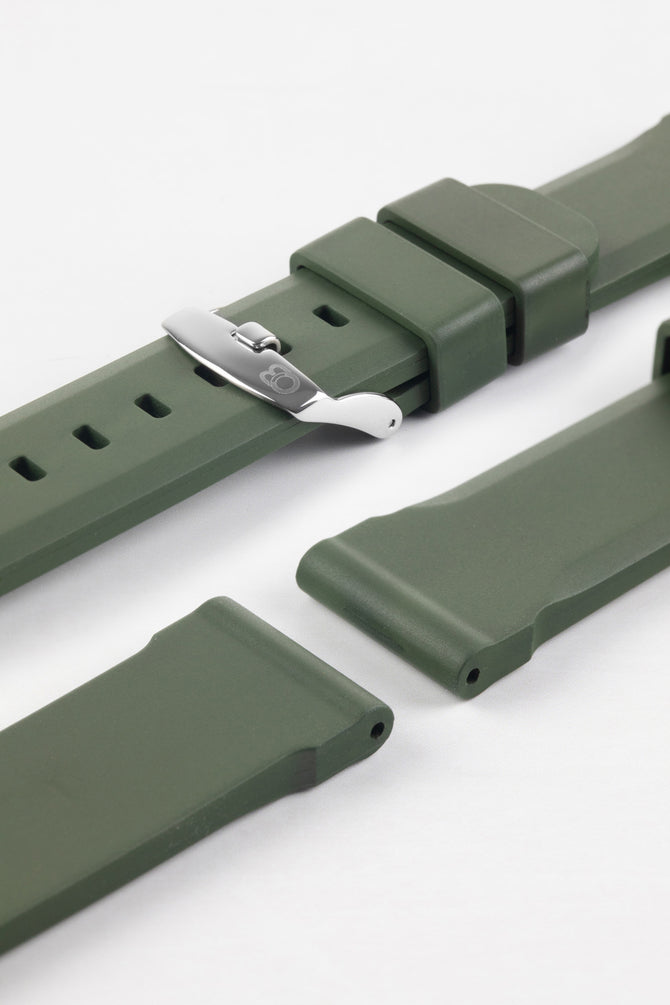 Lug and buckle end of Green Bonetto Cinturini 317 rubber watch strap with polished stainless steel embossed buckle