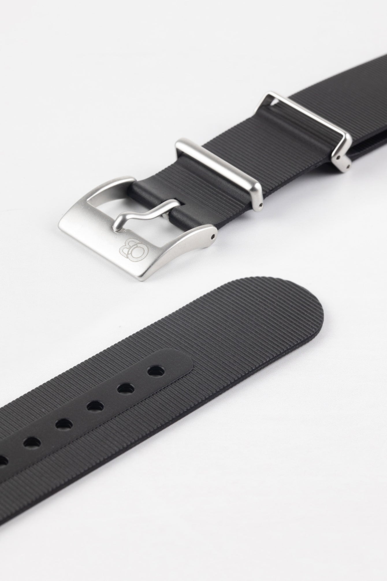 Buckle and adjustment holes of bonetto cinturini 328 in black with brushed stainless steel buckle