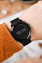 Garmin Vivo Active 3 black fitted with black bonetto cinturini 330 rubber watch strap on wrist with orange shirt