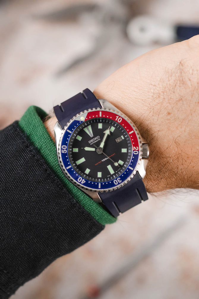 Crafter Blue CB05 Rubber Watch Strap in navy blue with stainless steel and embossed keeper fitted to Seiko SKX SDS001 Black dial red and blue pepsi bezel on wrist