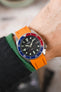 Crafter Blue CB05 Rubber Watch Strap in orange with stainless steel and embossed keeper fitted to Seiko SKX SDS001 Black dial red and blue pepsi bezel on wrist