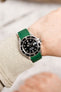 Rolex Submariner 16610 Oystersteel black dial and bezel fitted with green crafter blue rx01 worn on wrist