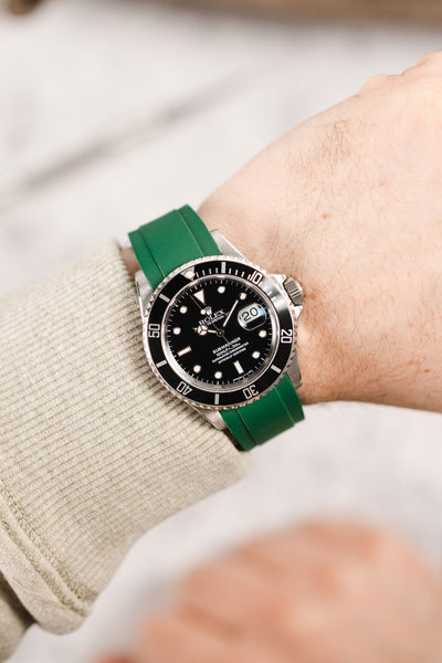 Rolex Submariner 16610 Oystersteel black dial and bezel fitted with green crafter blue rx01 worn on wrist