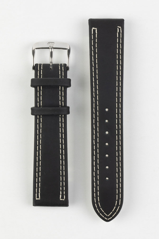 Upperside of di-modell colorado rubber coated leather watch strap in black with beige stitching