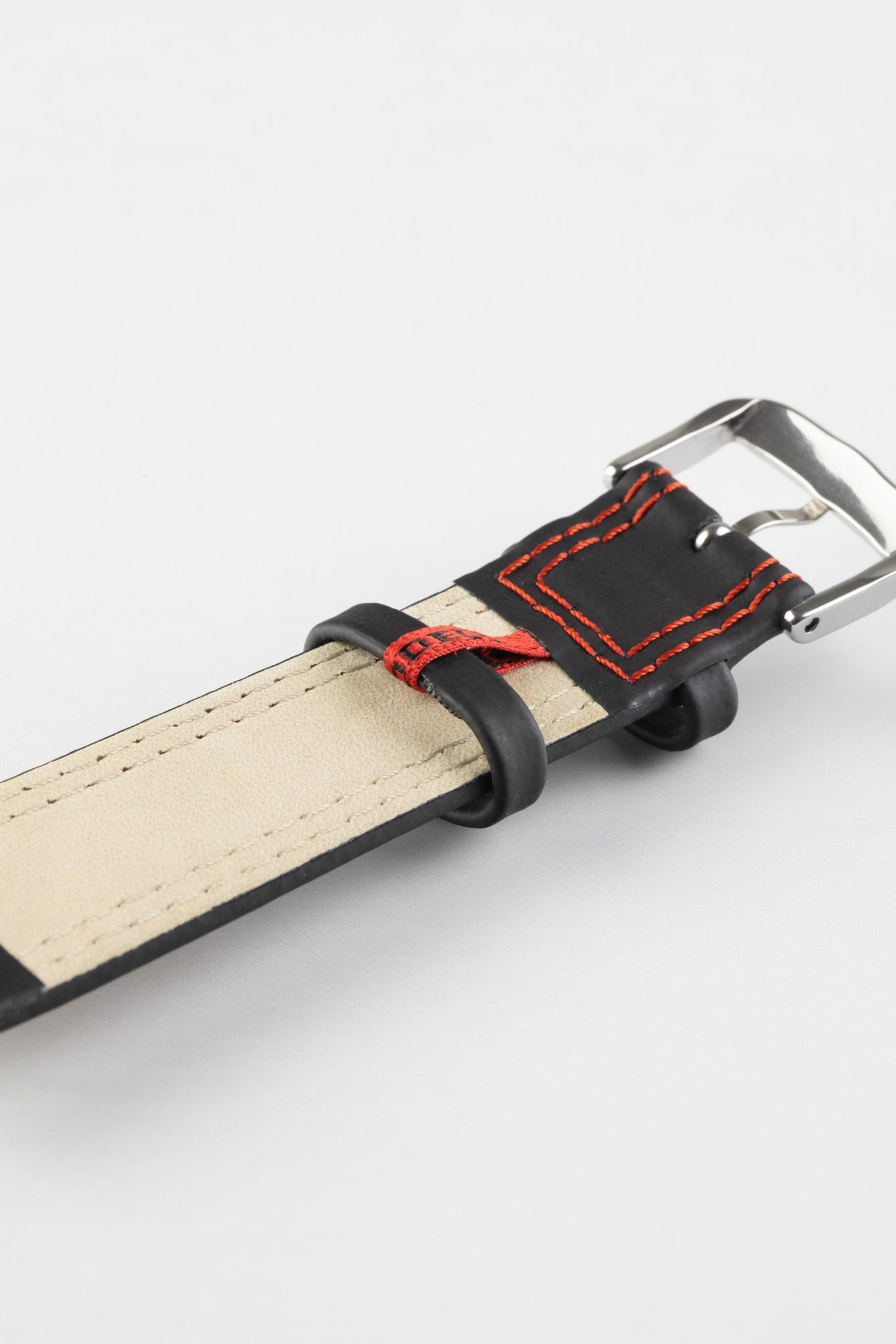 black watch strap with red stitching 