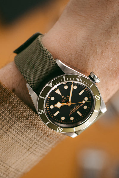 TUDOR Black Bay GMT 41mm - Harrods Green fitted with Elliot Brown webbing strap in grey green on wrist