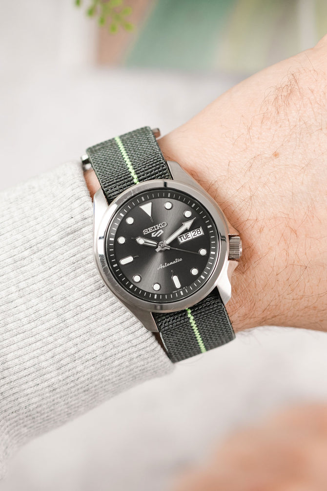 Seiko 5 sports anthracite dial SRPE51K1 fitted with Erika's Originals Mirage watchstrap with mint green centerline on wrist