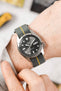 Seiko 5 sports anthracite dial SRPE51K1 fitted with Erika's Original Mirage Strap with yellow centerline on wrist