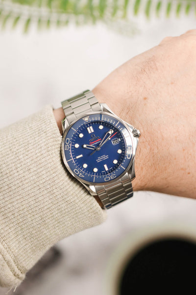 Omega Seamaster Blue Dial fitted with Forstner Contemporary Flat Link Bracelet in brushed worn on wrist