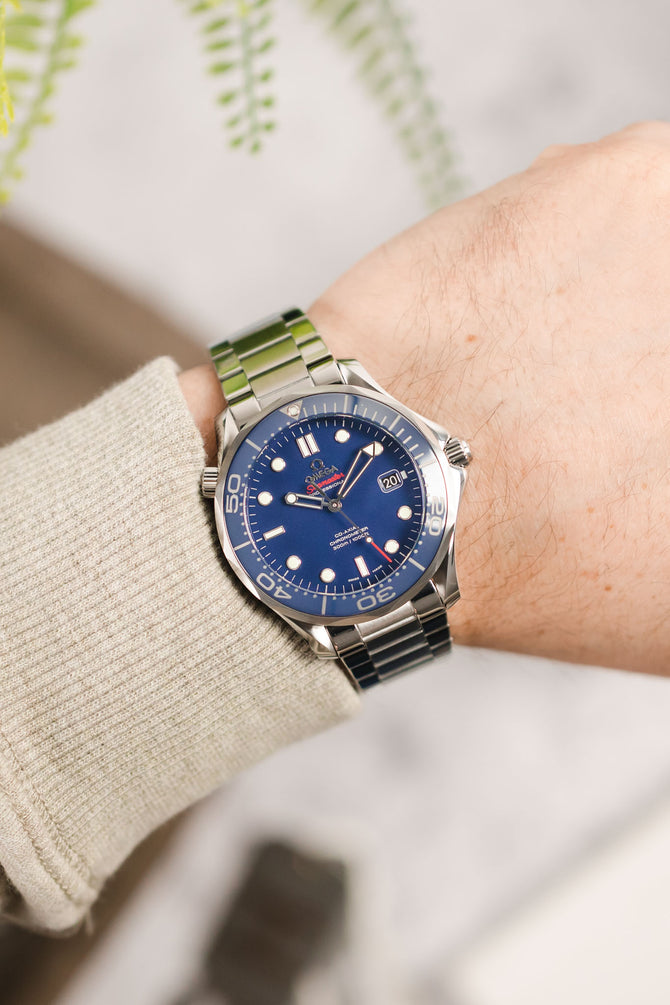 Omega Seamaster Blue Dial fitted with Forstner Contemporary Flat Link Watch Bacelet in polished and brushed worn on wrist