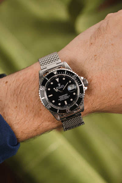 Rolex Submariner Black Dial fitted with Forstner Komfit 'JB' Stainless Steel Square Mesh Watch Bracelet wide version worn on wrist