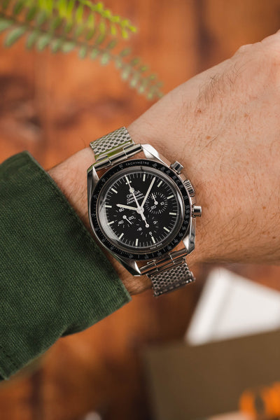 Omega Speedmaster Moonwatch Black Dial fitted with Forstner Komfit 'JB' Mesh Watch Bracelet worn on wrist