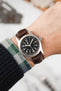 Hamilton Khaki Field Watch fitted with Hirsch Duke brown leather strap worn on wrist