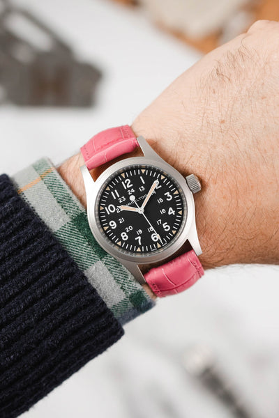 Hamilton Khaki Field Watch fitted with Hirsch Duke pink leather watch strap worn on wrist