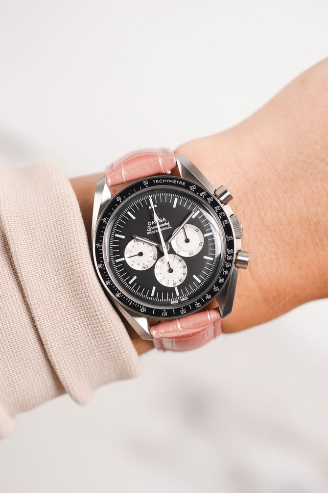 Omega Speedmaster Moonwatch Panda Chronograph fitted with Hirsch Duke Metallic rose leather watch strap worn on wrist