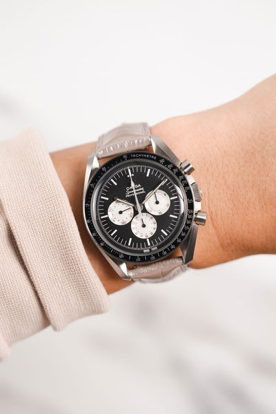 Omega Speedmaster Moonwatch Panda Chronograph fitted with Hirsch Duke Metallic Silver leather watch strap worn on wrist