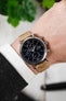 IWC Portofino Chronograph fitted with Hirsch Genuine Crocodile Beige leather watch strap worn on wrist 