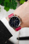 IWC Portofino Chronograph fitted with Hirsch Genuine Crocodile pink leather watch strap worn on wrist
