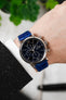 IWC Portofino Chronograph fitted with Hirsch Genuine Crocodile royal blue leather watch strap worn on wrist