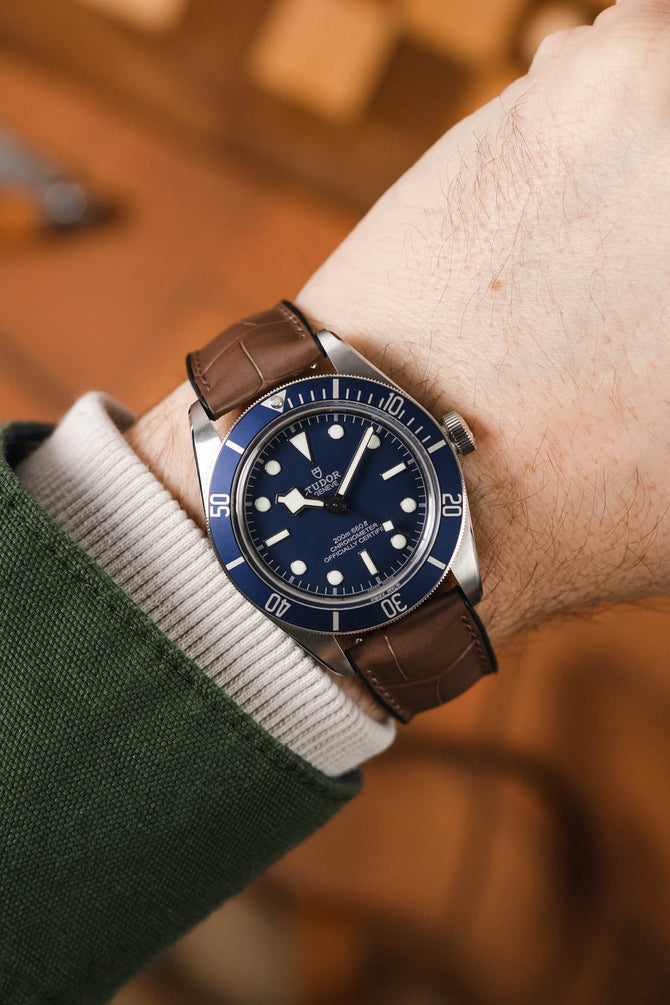 Blue Tudor Black Bay 58 fited with Hirsch Ian warm grey Alligator watch strap worn on wrist
