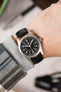 Hamilton Khaki Field watch fitted with Hirsch Kansas Black Leather watch strap worn on wrist 