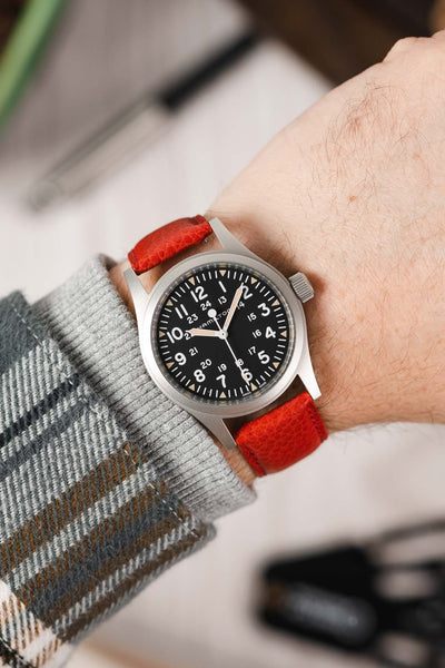 Hamilton Khaki Field watch fitted with Hirsch Kansas red Leather watch strap worn on wrist