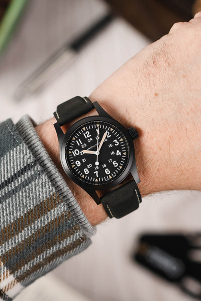 Hamilton Khaki Field Watch fitted with Hirsch Mariner Black leather watch strap worn on wrist
