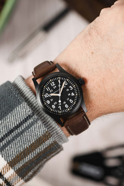 Hamilton Khaki Field Watch fitted with Hirsch Mariner brown leather watch strap worn on wrist