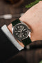 Grey Seiko 5 Sports SRPE55 fitted with Hirsch Osiris green leather watch strap