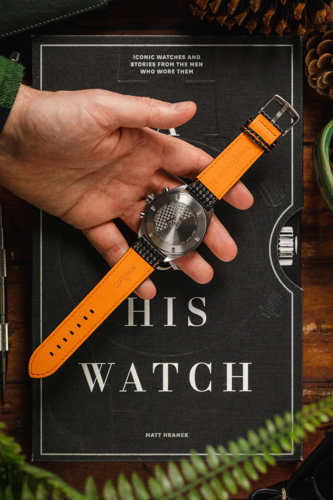 black watch strap orange stitch 