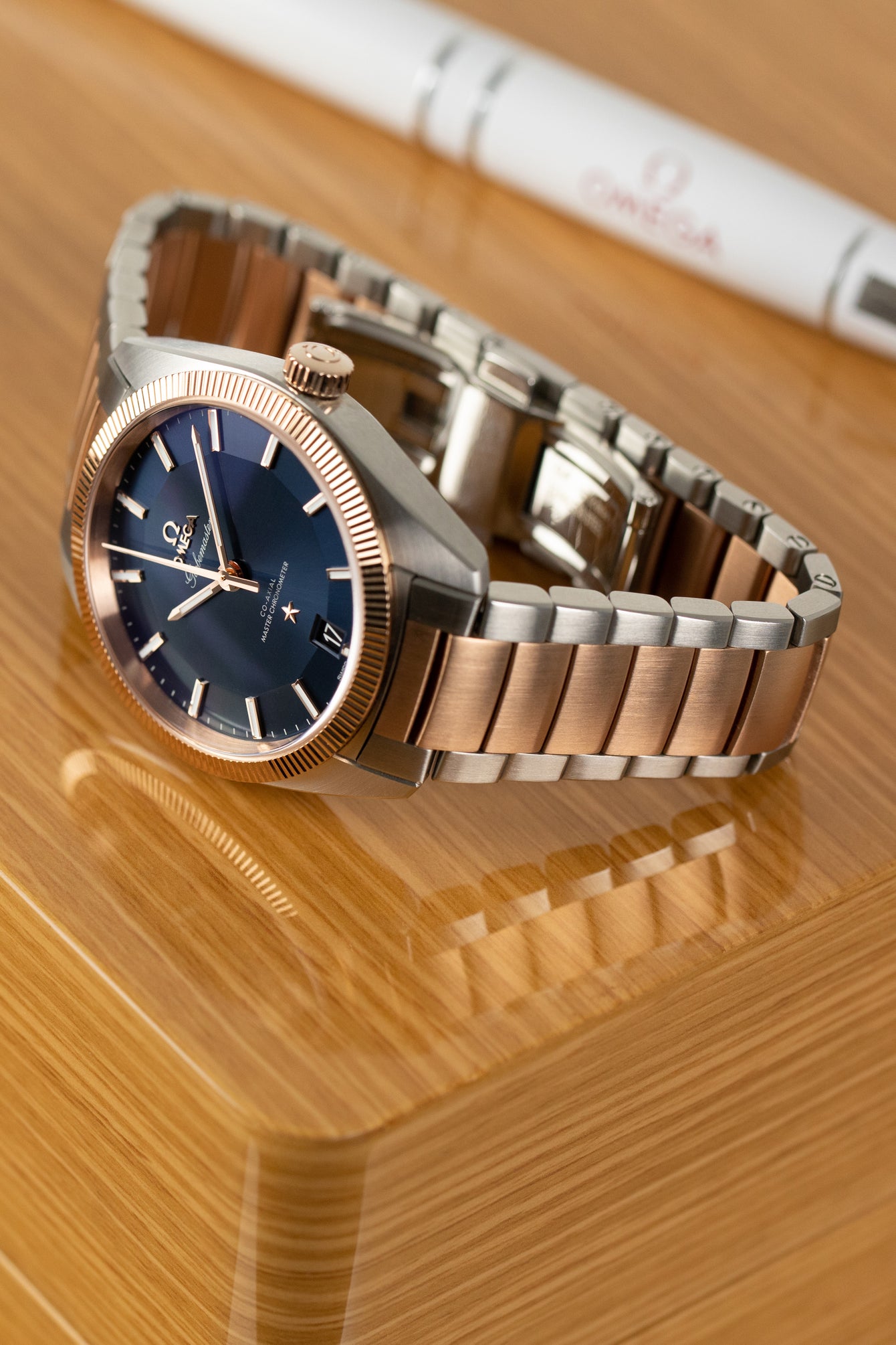 Omega Globemaster 18K Sedna gold blue WatchObsession – Watch