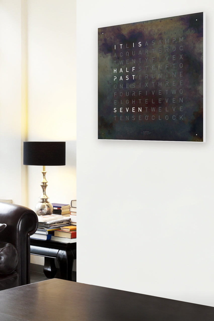 iron wall clock (on wall)