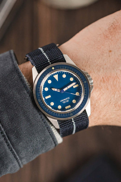 Unimatic U1-MLM blue fitted with Erika's Originals Trident MN watch strap with lumed centerline
