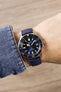 navy blue watch strap on wrist