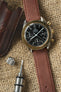 Omega Speedmaster gold bezel black dial fitted with Di Modell Natural watch strap in Golden Brown