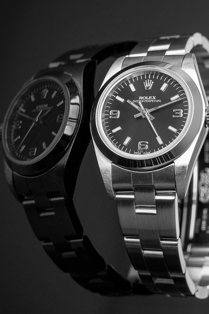 ROLEX Oyster Perpetual 76080 Ladies Automatic Steel Watch 24mm with Black Dial